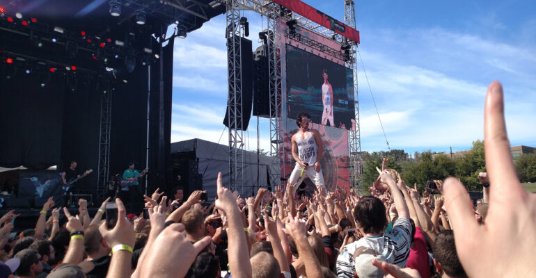 Jesse Hasek crowd surfing while performing at Louder than Life 2015 in Louisville, Kentucky
