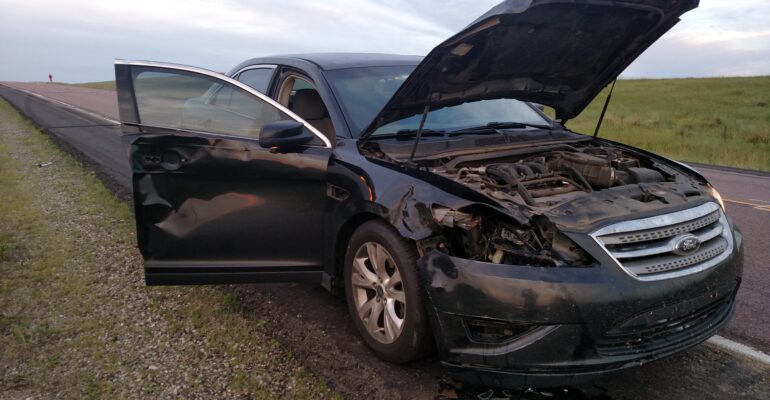 My car after hitting a deer in South Dakota